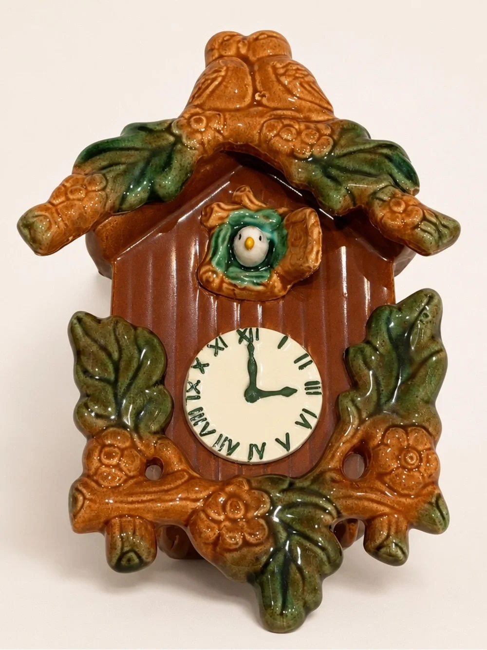 Ceramic Cuckoo Clock Wall Accent in Brown and Green